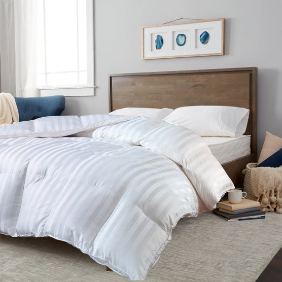 White down alternative comforter with cotton sateen cover and damask stripe design White down alternative comforter with cotton sateen cover and damask stripe design