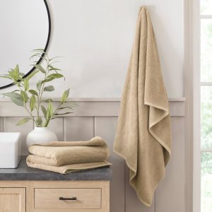 Two ribbed cotton bath towels with a modern textured weave